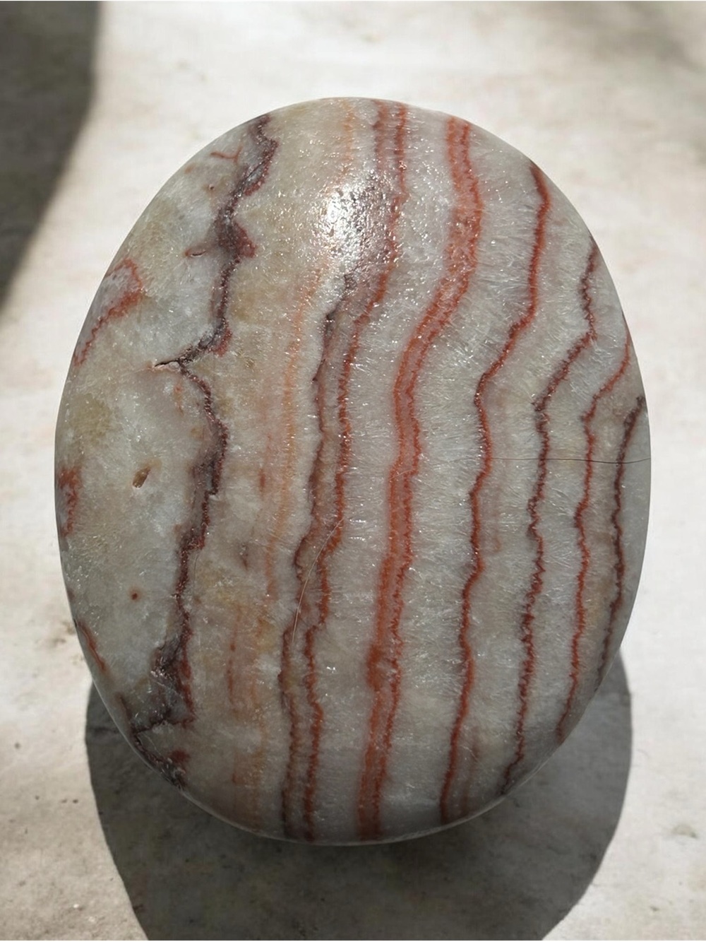 Polished White and Red Rhodochrosite Palm Stone